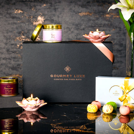 Elegant gourmet gift hamper by Exclusively Luxe with sweets and flowers