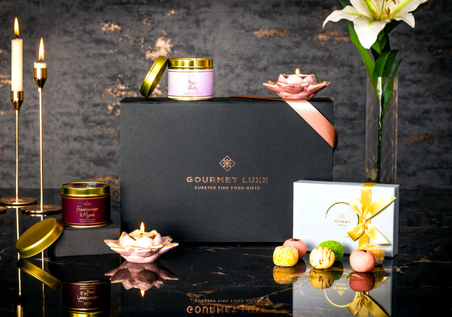 Elegant gourmet gift hamper by Exclusively Luxe with sweets and flowers